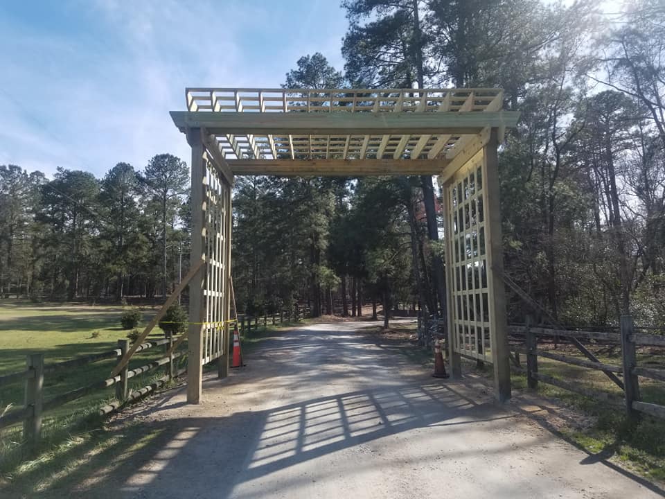 Custom pergola archway over driveway